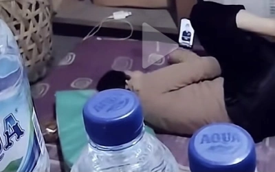 Link Botol Aqua Mulai Dicari, Ini Kronologi Tersebarnya Video Pose Tiduran Pemilik Warung