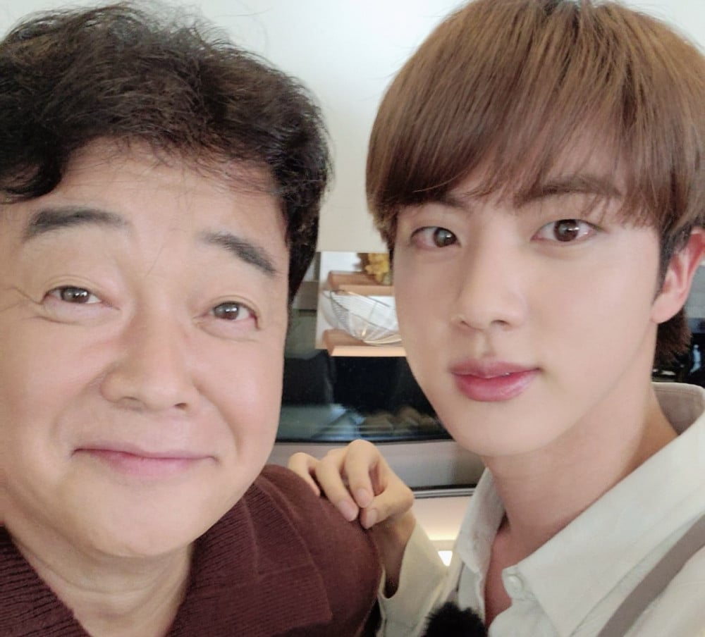 Stop Karena Wamil, Jin BTS Lanjutkan Proyek Minuman Alkohol Bareng Baek Jong Won