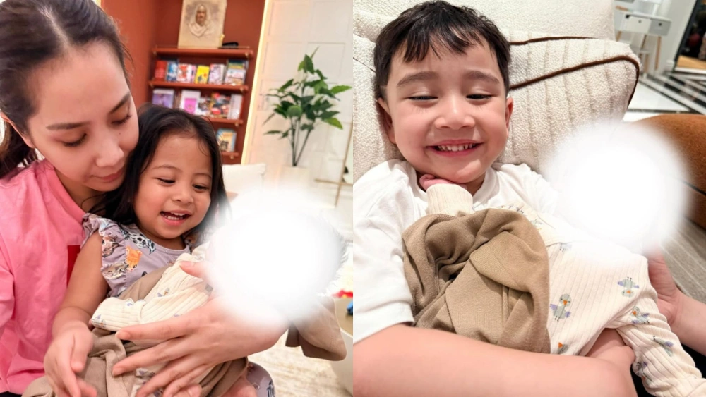 Nagita dengan anak-anaknya saat menggendong Baby Muhammad. [Instagram]