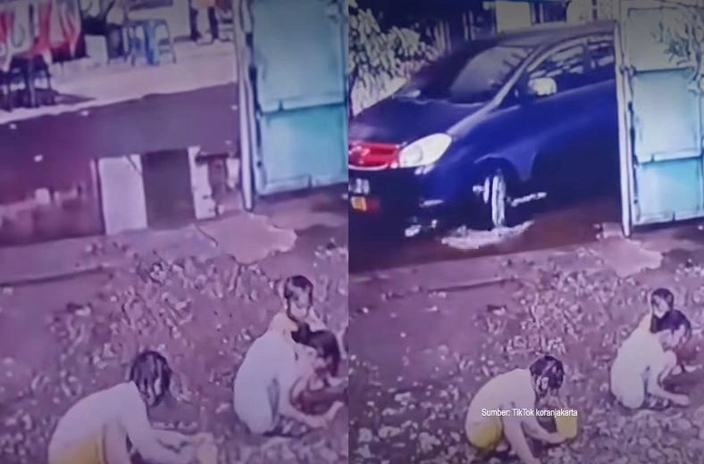 Sebuah Mobil Menabrak Anak Yang Sedang Jongkok Bermain Tiktok