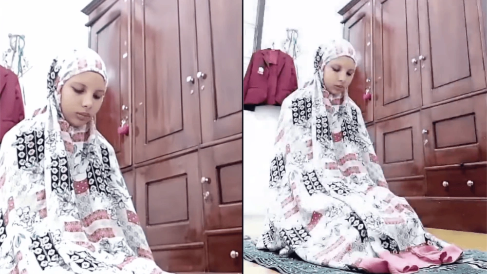 Mukena pink yang lagi viral. [TikTok]