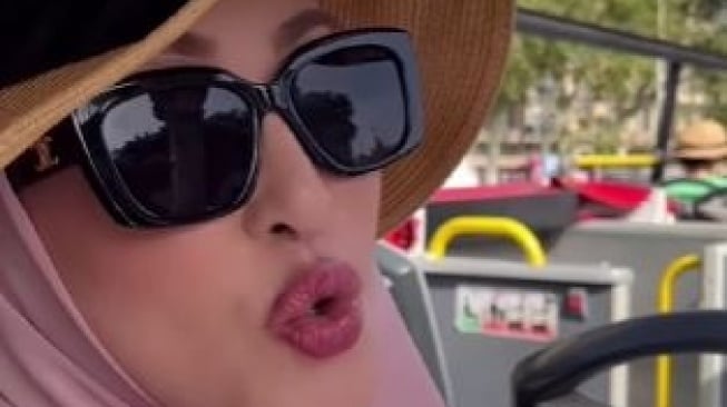 Angelina Sondakh di Barcelona
